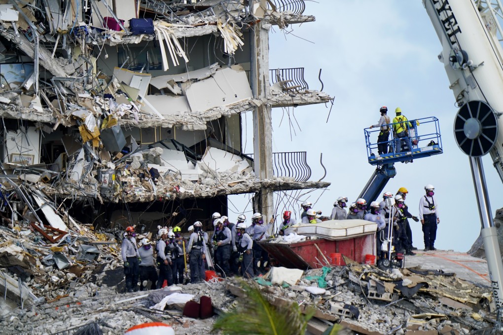 Workers search the rubble at the Champlain Towers South in Surfside, Florida. Photo: AP
