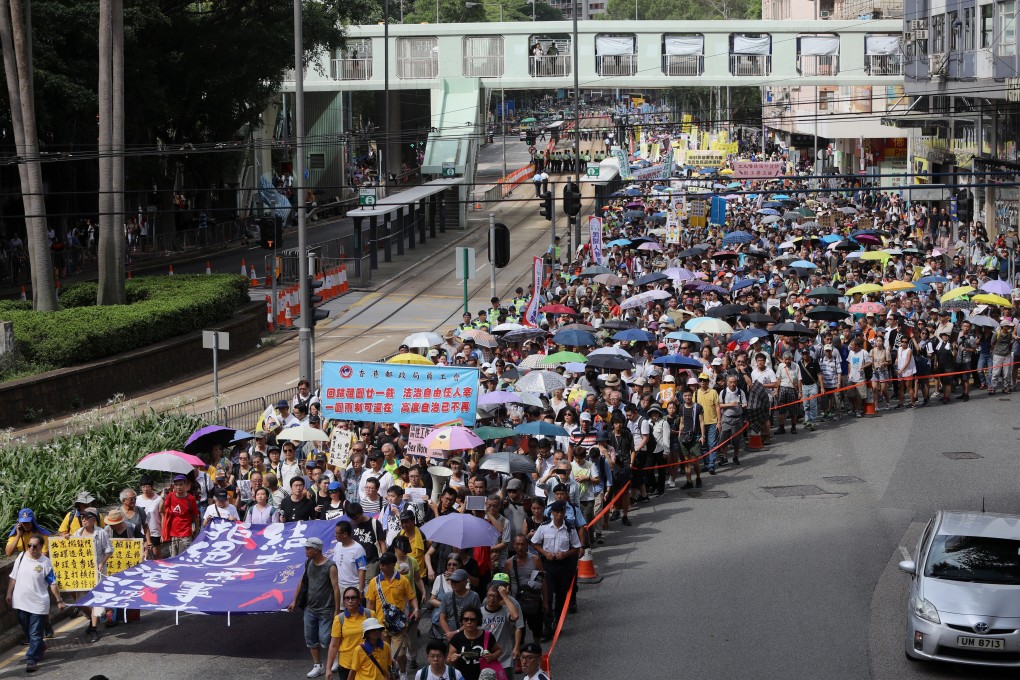 People participate in a July 1 rally in 2018. Police on Monday denied an application for this year’s rally, citing the pandemic. Photo: Sam Tsang