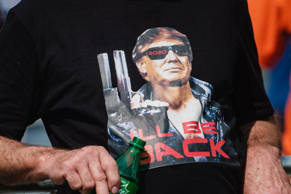 A Trump supporter wears a T-shirt depicting the former US president as ‘The Terminator’. Photo: DPA