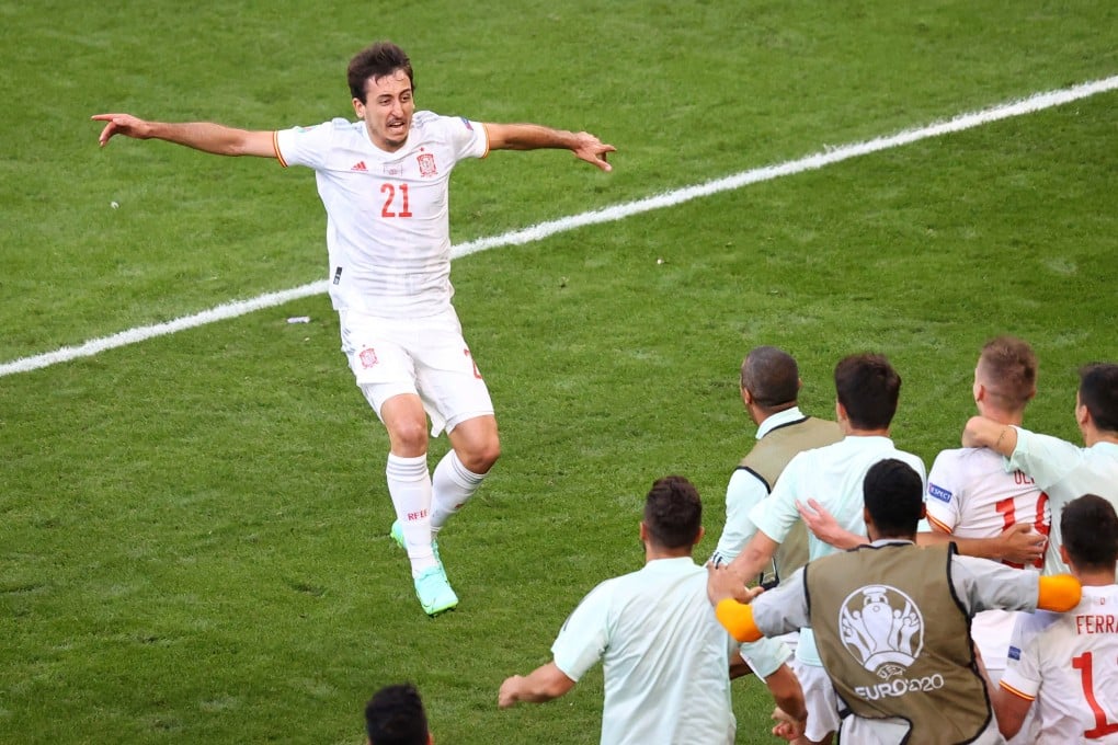 Spain’s Mikel Oyarzabal celebrates scoring their fifth goal with teammates. Photo: Reuters