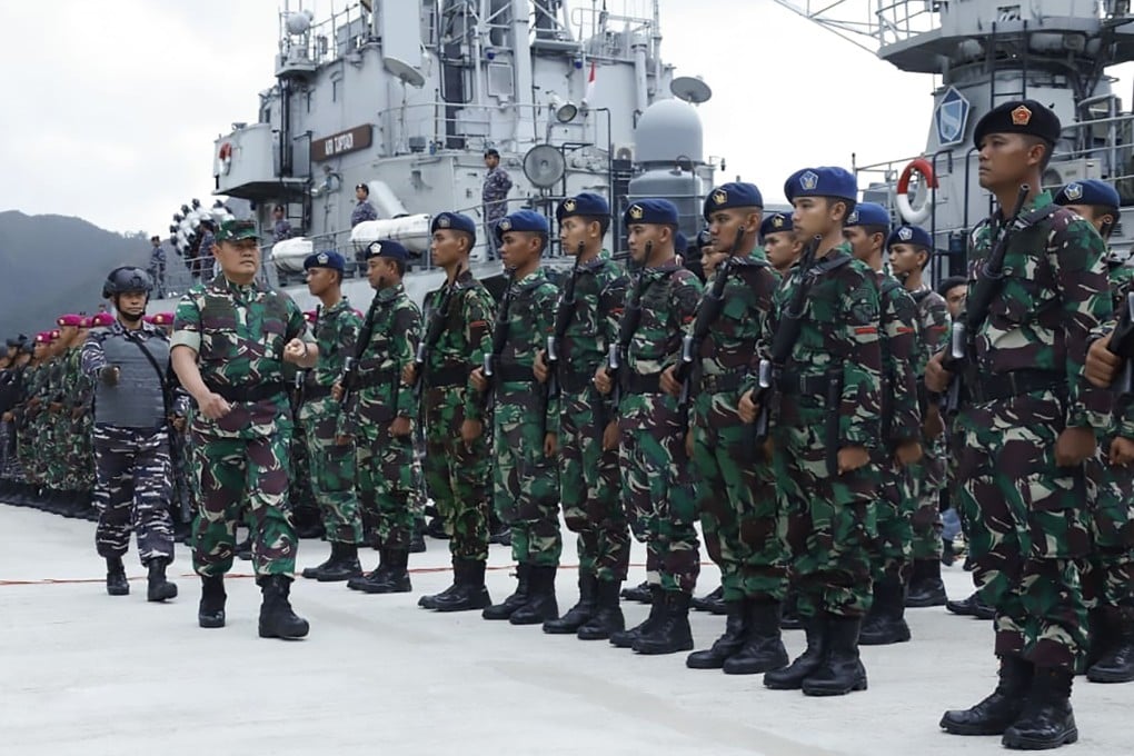 Indonesian troops are inspected at a military base in the Riau islands. The country has received millions in military education and training funds from the US in the last year. Photo: AFP