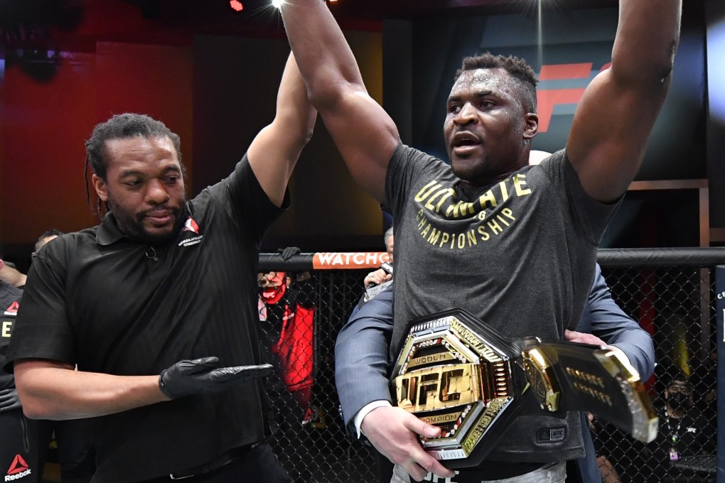 Francis Ngannou celebrates after his victory over Stipe Miocic in their heavyweight title fight at UFC 260. Photo: Jeff Bottari/Zuffa LLC