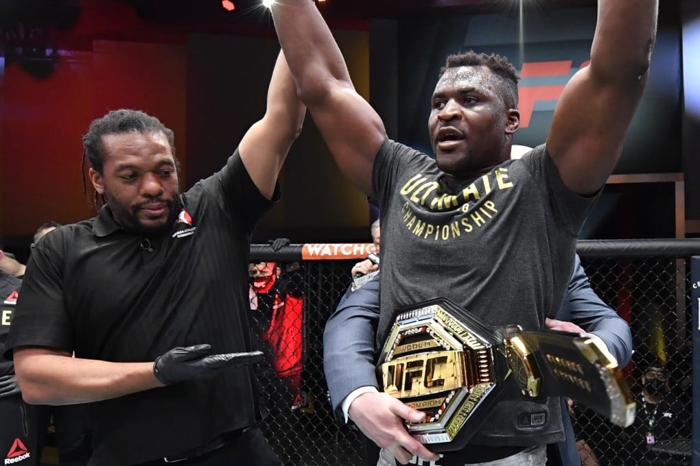 Francis Ngannou celebrates after his victory over Stipe Miocic in their heavyweight title fight at UFC 260. Photo: Jeff Bottari/Zuffa LLC