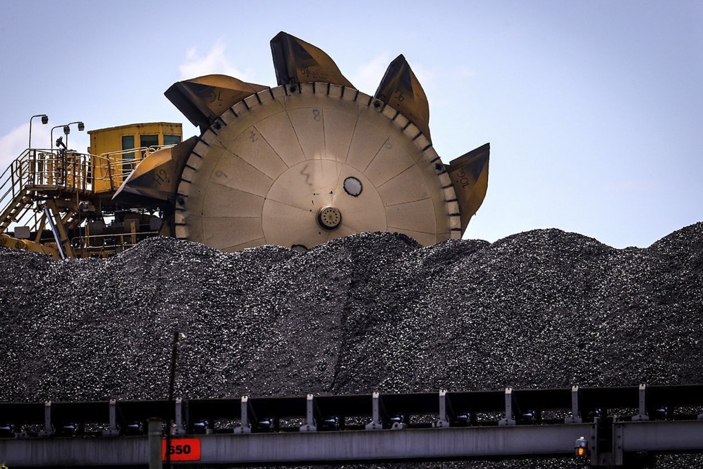 Coal is piled up at the Port of Newcastle in Australia, which has not shipped any coal to China in the past six months. Photo: Bloomberg