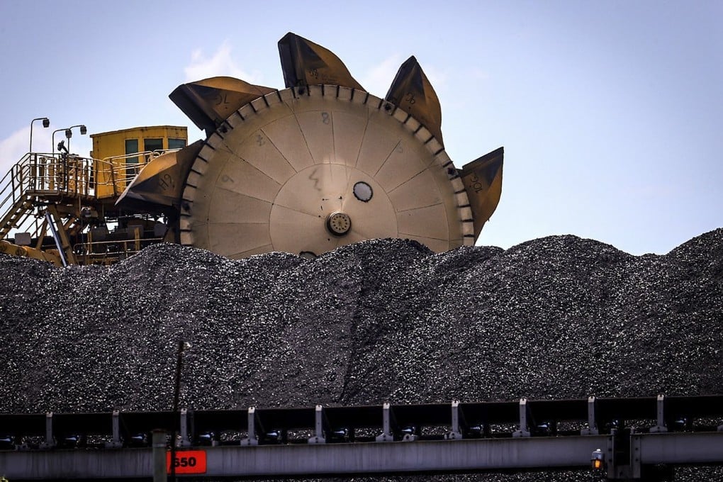 Coal is piled up at the Port of Newcastle in Australia, which has not shipped any coal to China in the past six months. Photo: Bloomberg