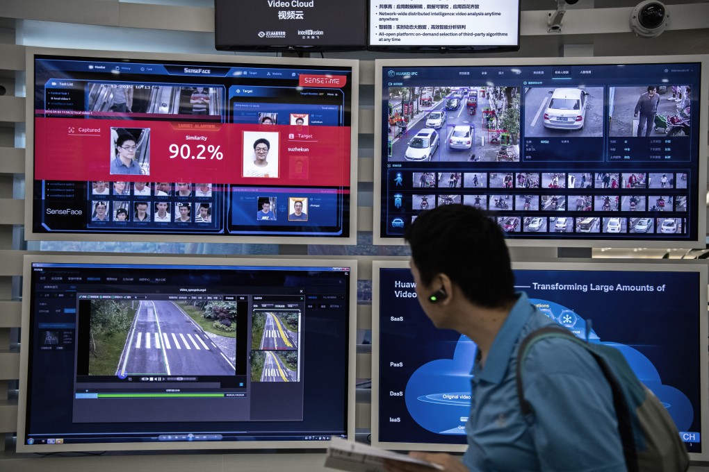 A display for facial recognition and artificial intelligence is seen on monitors at Huawei's campus in Shenzhen, China. Photo: Getty Images