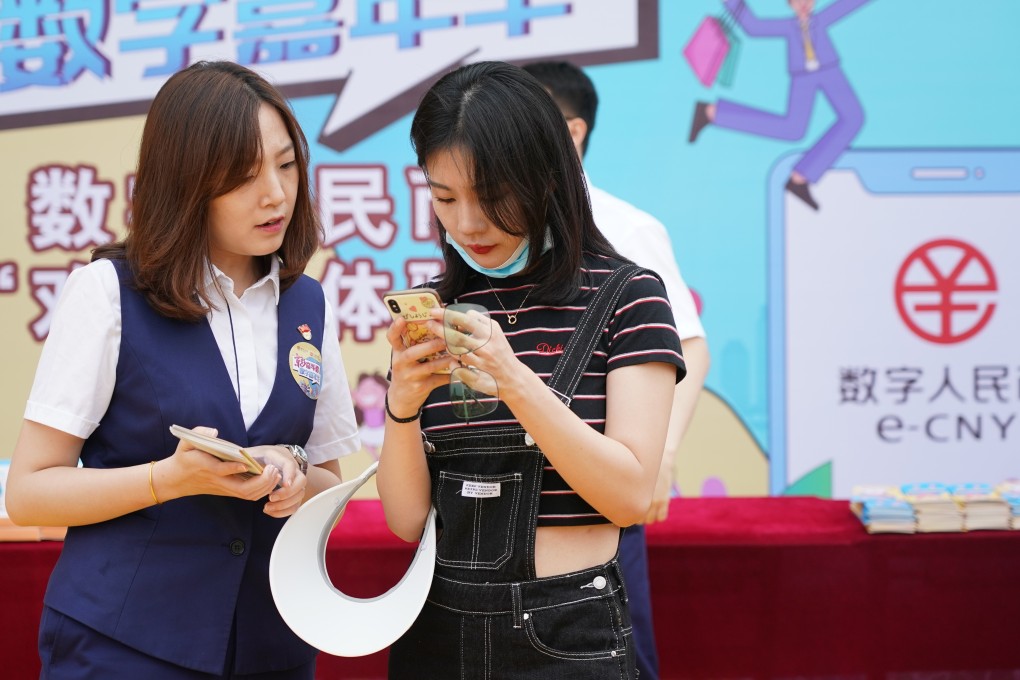 The People’s Bank of China has tried to allay fears of a potential threat to the US dollar by saying its goal is not to replace currencies, and that its efforts are aimed at domestic use. Photo: Xinhua