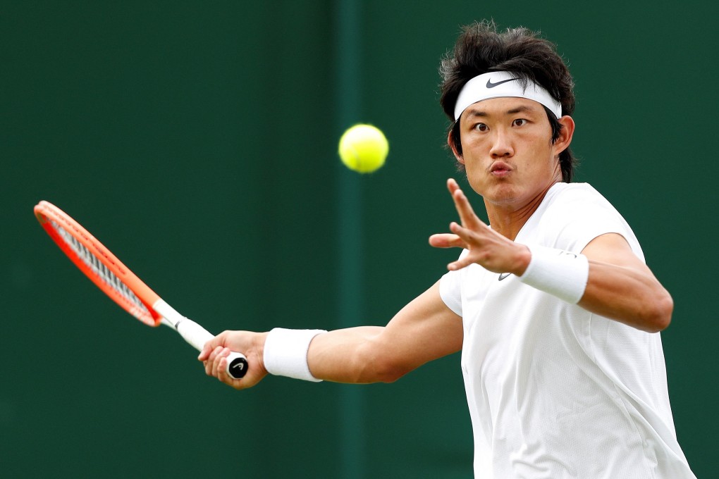 China’s Zhizhen Zhang returns against France’s Antoine Hoang during their men’s singles first round match on the second day of the 2021 Wimbledon Championships at The All England Tennis Club in Wimbledon on Tuesday. Photo: AFP