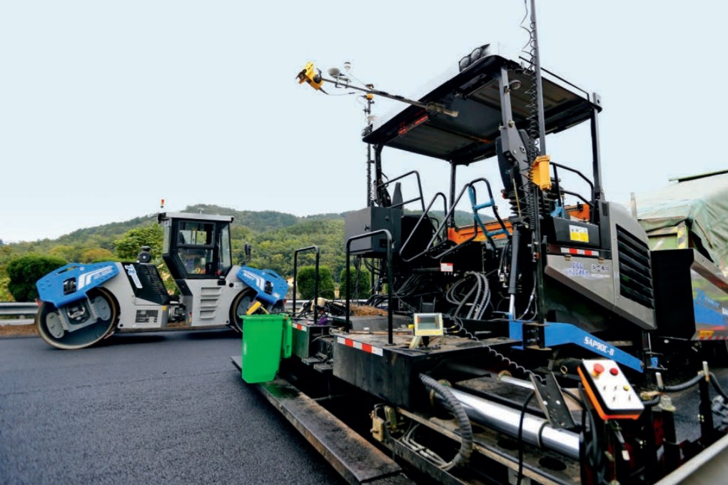 Road maintenance robots work on a motorway in Zhejiang province. Photo: Handout