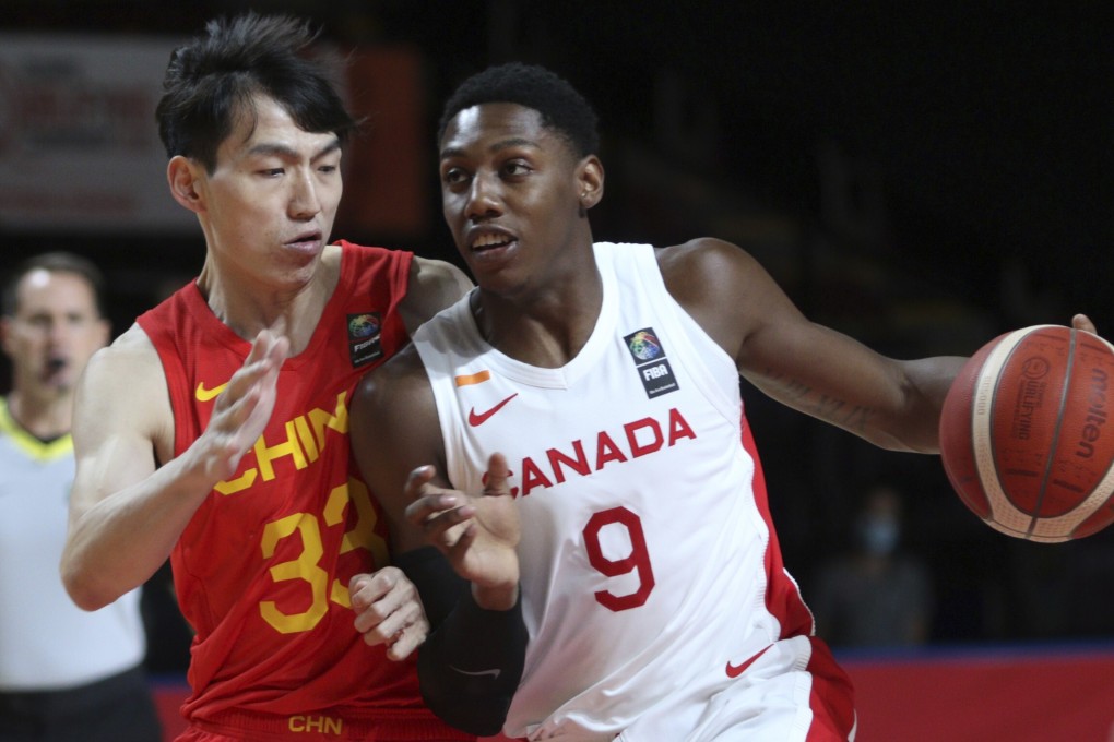 Canada’s RJ Barrett protects the ball from China’s Wu Qian during their Fiba men’s Olympic basketball qualifying game. Photo: AP