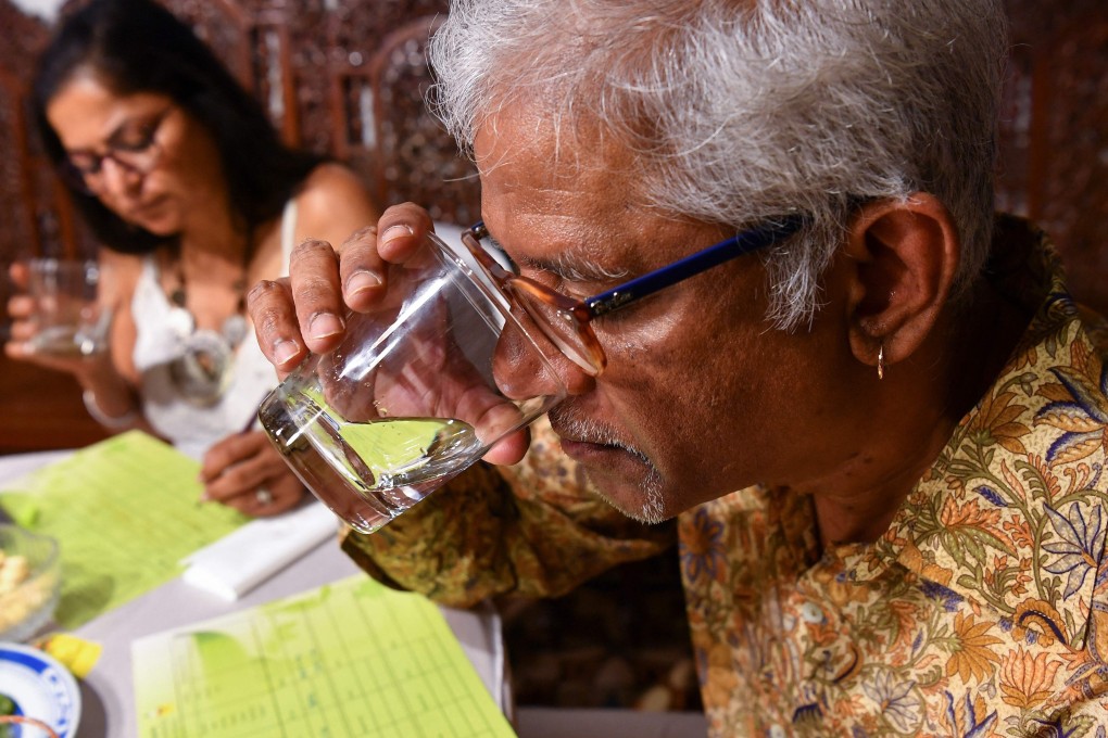 A feni tasting session at Saligao in North Goa. Photo: AFP