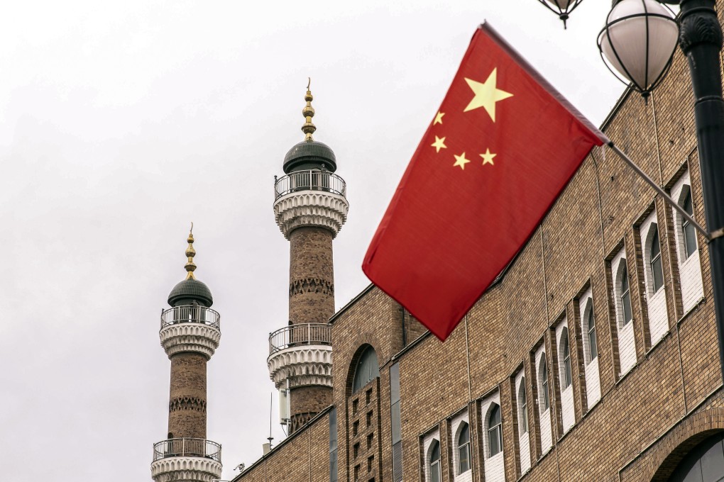 A Chinese national flag outside the Xinjiang International Grand Bazaar in Urumqi, Xinjiang province, China, on Wednesday, May 12, 2021. China has told nations criticizing its policies inÂ XinjiangÂ to stop interfering in domestic affairs. Source: Bloomberg