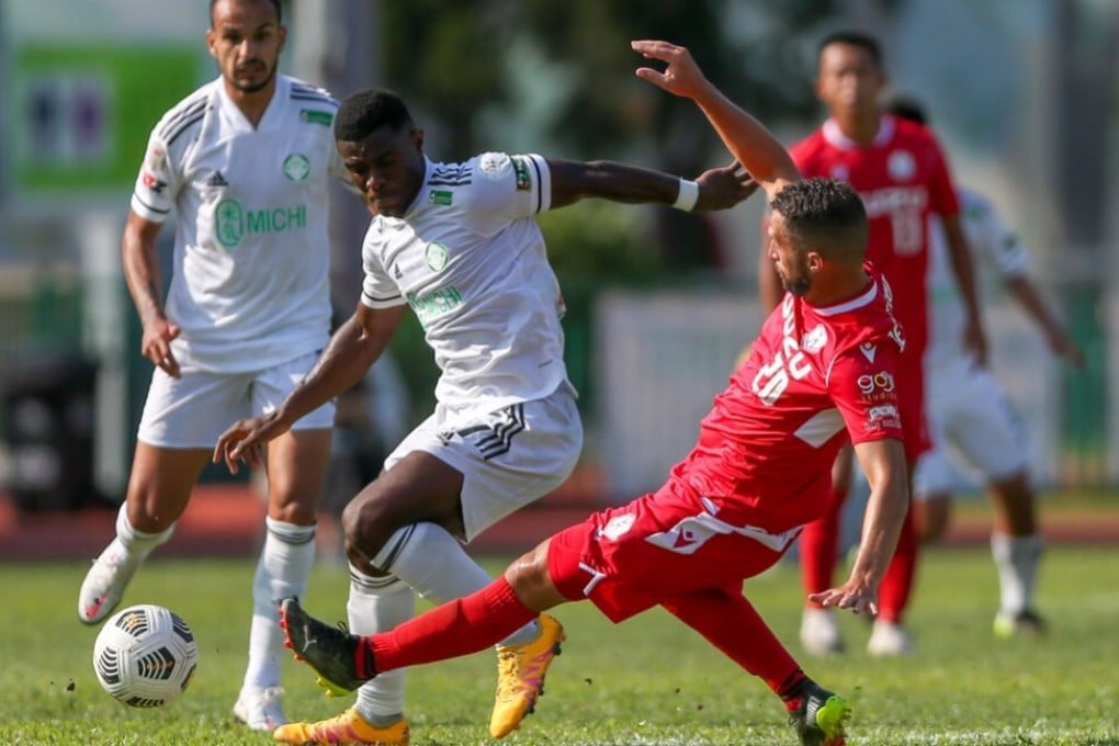 Happy Valley’s Robert Odu and Southern’s Roberto Fronza battle for the ball in the Hong Kong Premier League at Aberdeen Sports Ground. Photo: HKFA