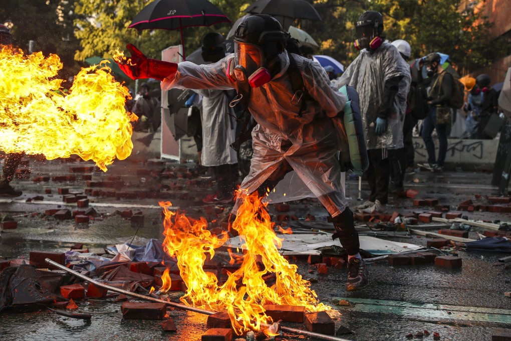 Police and protesters clashed outside Polytechnic University in November, 2019. Photo: Sam Tsang