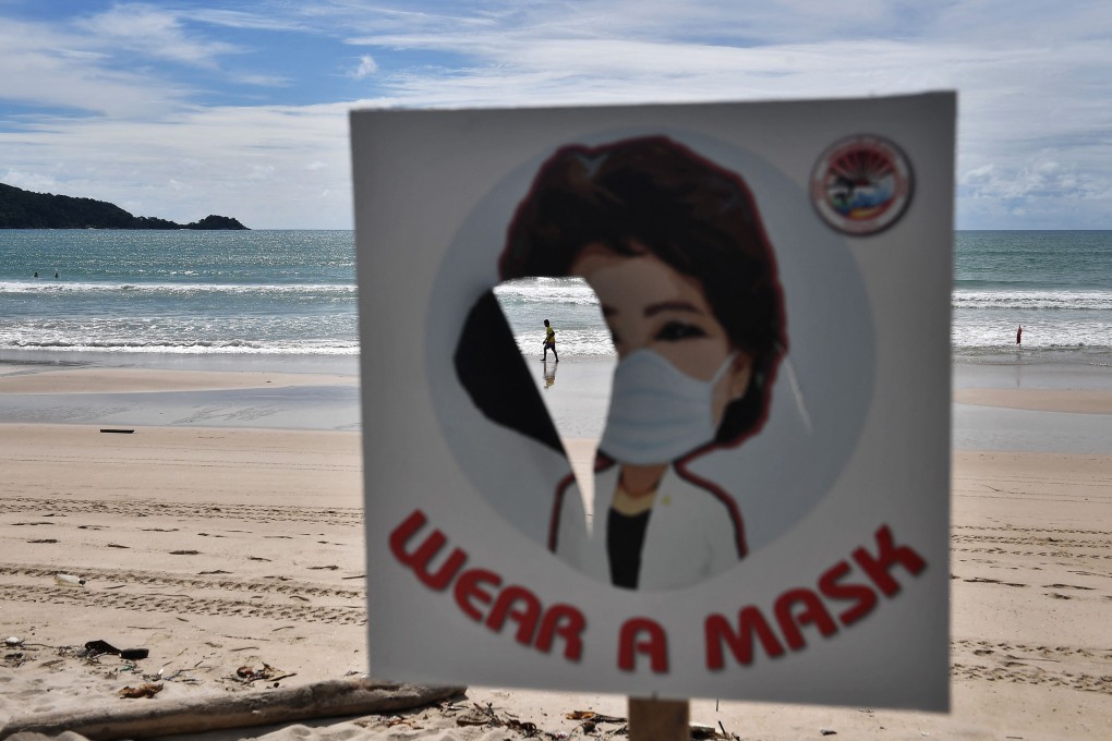 A man walks along an empty Patong beach in Phuket in October 2020. Photo: AFP