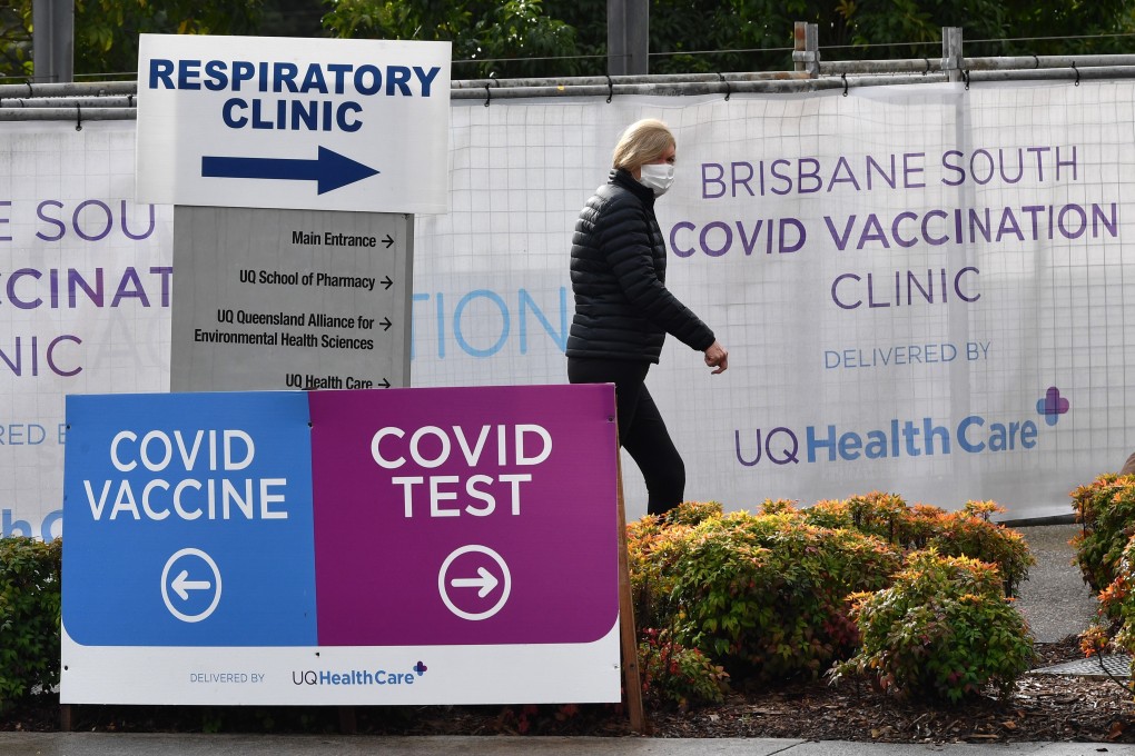 A woman leaves a vaccination clinic in Brisbane. Photo: EPA-EFE