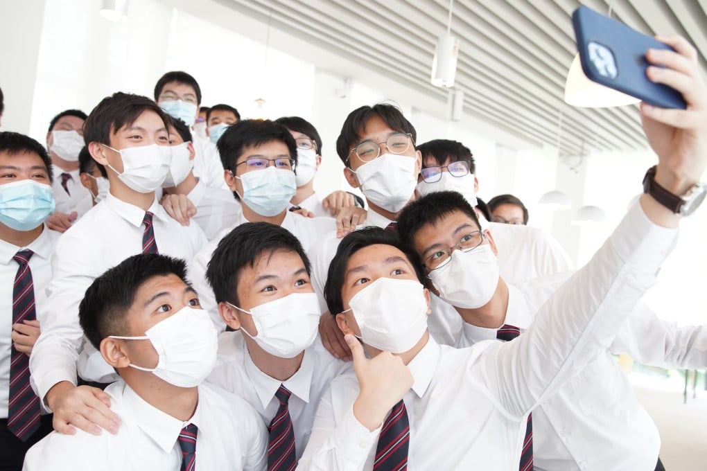Students from the Diocesan Boys' School who got perfect scores in the International Baccalaureate exams pose for a selfie. Photo: Winson Wong