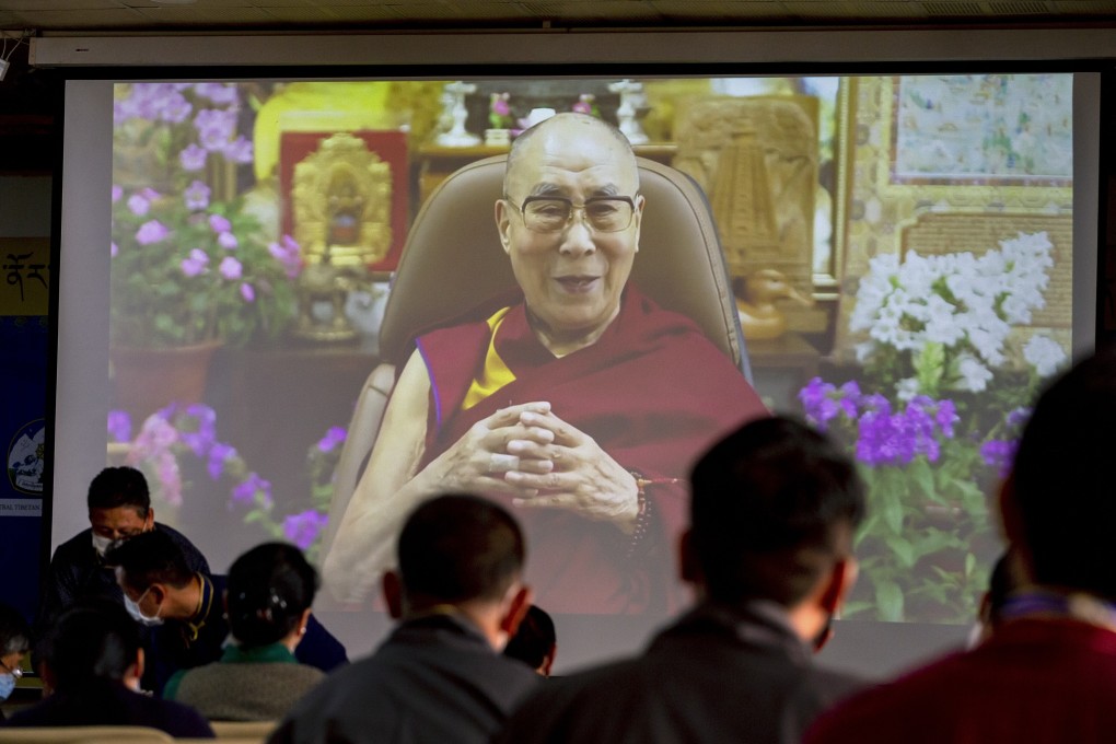 Exiled Tibetan government officials watch a video message from the 14th Dalai Lama in Dharamshala, India, on July 6, 2021. Photo: AP