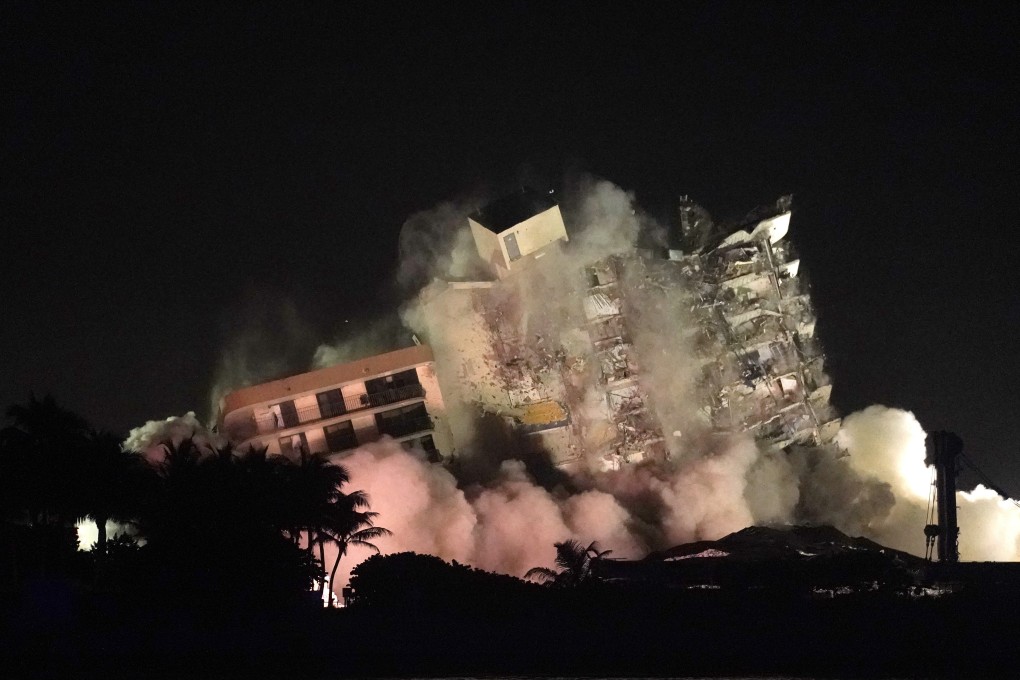The remaining structure of the Champlain Towers South condo building is demolished more than a week after it partially collapsed. Photo: AP