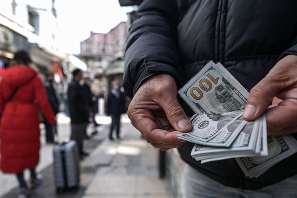 China’s foreign exchange deposits hit a historic high of US$1.01 trillion at end of May, up 35.7 per cent from a year earlier, after having surpassed US$1 trillion for the first time in April, according to data from the People’s Bank of China (PBOC). Photo: AFP