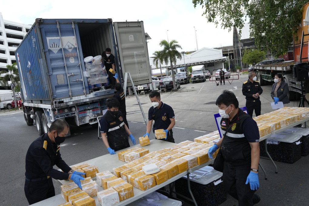 Thai customs officials display seized heroin at the customs headquarters in Bangkok, Thailand on Tuesday. Photo: AP