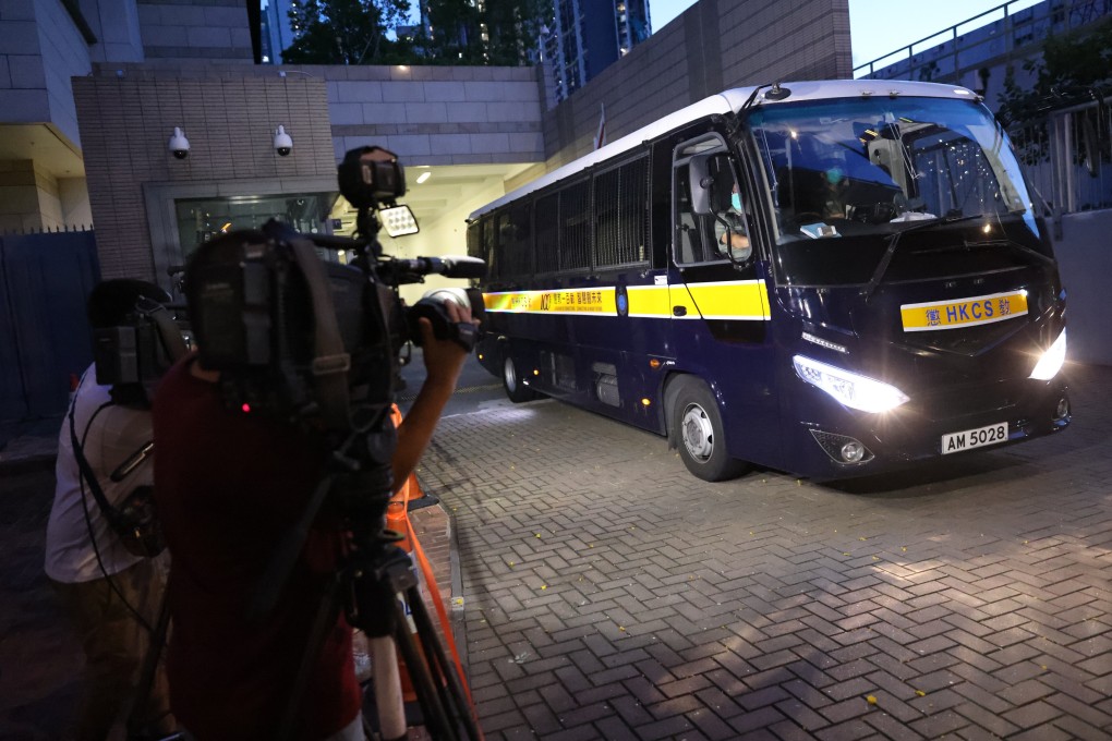 A Correctional Services Department van outside West Kowloon Court, where the three teens were charged. Photo: May Tse