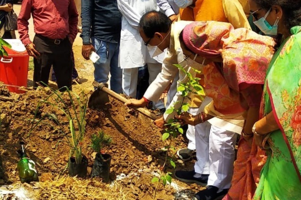 Shivraj Singh Chouhan, the chief minister of Madhya Pradesh state, plants the first sapling at the memorial park near the Bhadbhada Vishram Ghat crematorium. Photo: Handout