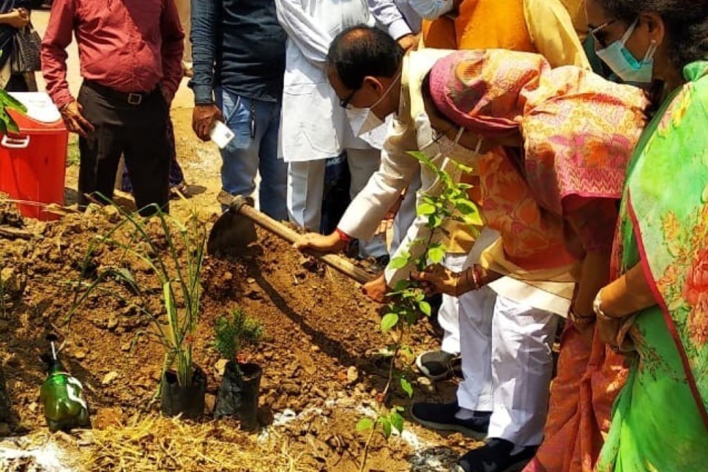 Shivraj Singh Chouhan, the chief minister of Madhya Pradesh state, plants the first sapling at the memorial park near the Bhadbhada Vishram Ghat crematorium. Photo: Handout