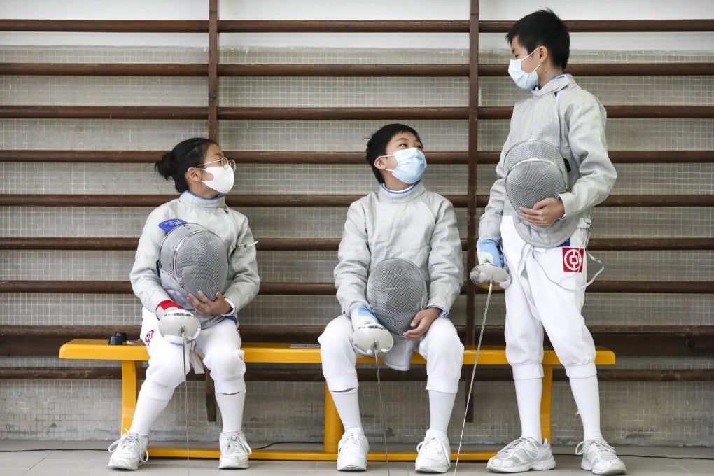 Alliance Primary School students Janelle Lee Po-ying, Brian Chan Ching-hang and George Huon Ka-yu after a fencing programme class in Tai Hang Tung. Photos: Jonathan Wong