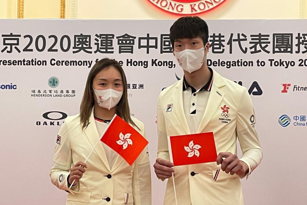 Tse Ying-suet and Cheung Ka-long at the flag presentation ceremony at Government House. Photo: Hong Kong Olympic Committee
