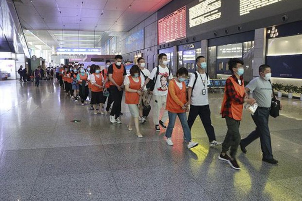 People suspected of taking part in a scheme to convince people they can be reunited with their ex are detained in Shandong province. Photo: The Paper