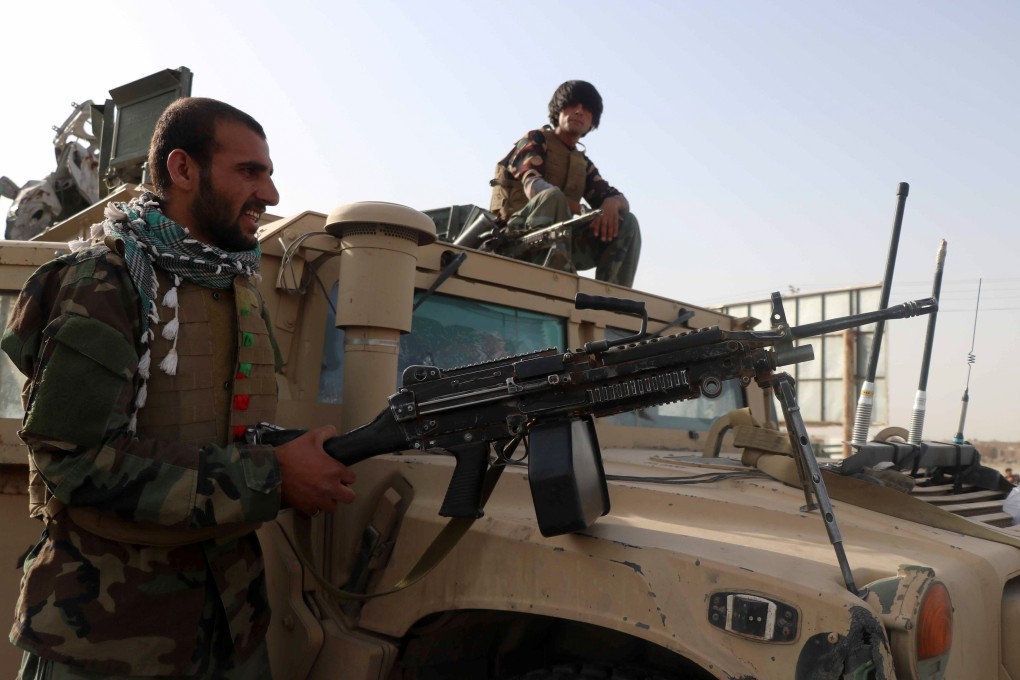 Afghan soldiers keep watch at a checkpoint in the Guzara district of Herat province. Photo: Reuters