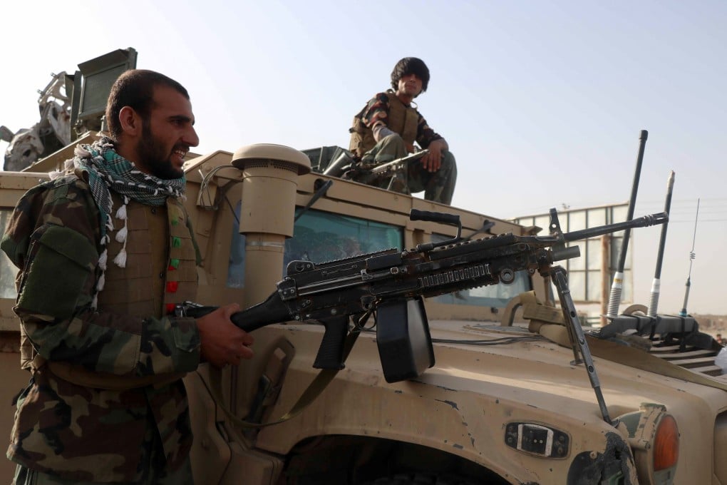 Afghan soldiers keep watch at a checkpoint in the Guzara district of Herat province. Photo: Reuters