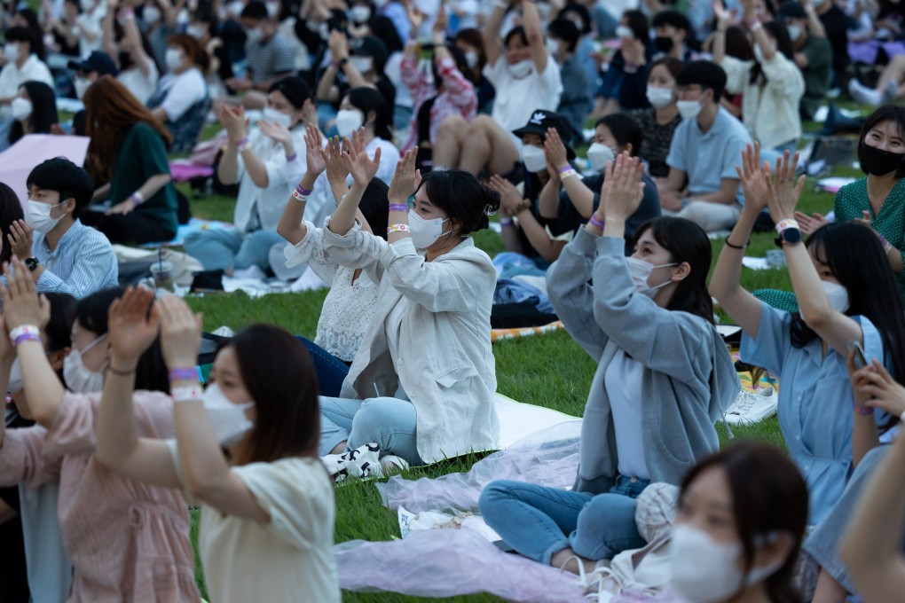 Attendees are seen at a music festival in Seoul, South Korea, last month. Photo: Bloomberg