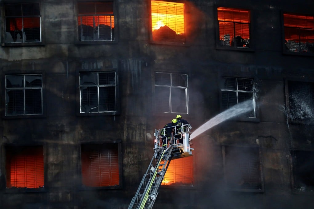 Firefighters try to extinguish a blaze that broke out at a factory in Rupganj, Bangladesh. Photo: Reuters