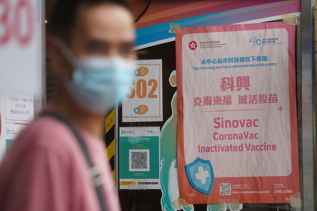 A man queues up for a Sinovac jab in Kowloon Bay last month. Photo: Winson Wong