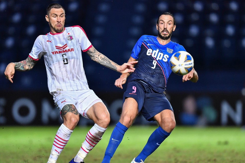 Kitchee's Dejan Damjanovic (right) in action against Cerezo Osaka‘s Tiago Pagnussat during their AFC Champions League 2021 Group J match at Buriram Stadium. Photo: AFC