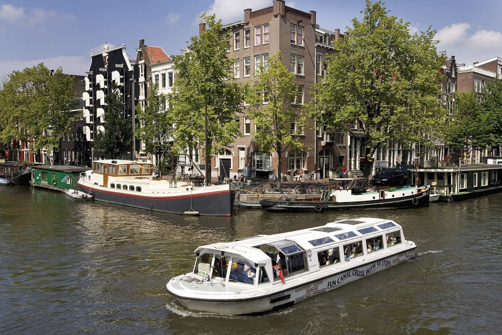 A tourist boat in Amsterdam. Photo: Reuters