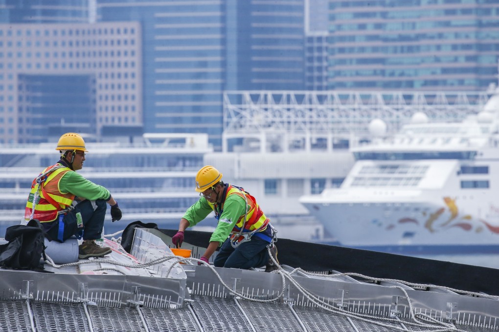 Workers at a construction in Hong Kong. Photo: David Wong