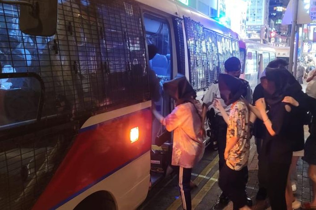 Hong Kong police made 68 arrests during a series of raids on illegal massage parlours in Wan Chai and Causeway Bay on Friday. Photo: Hong Kong Police Force