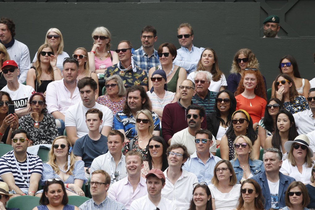 Spectators watch the tennis at Wimbledon. Photo: Reuters