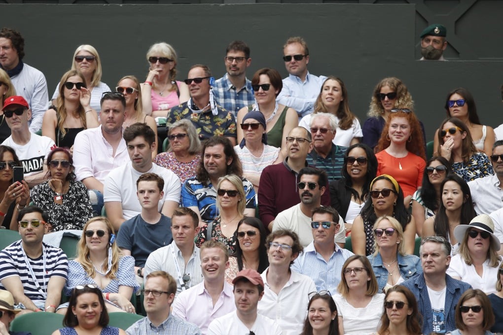 Spectators watch the tennis at Wimbledon. Photo: Reuters