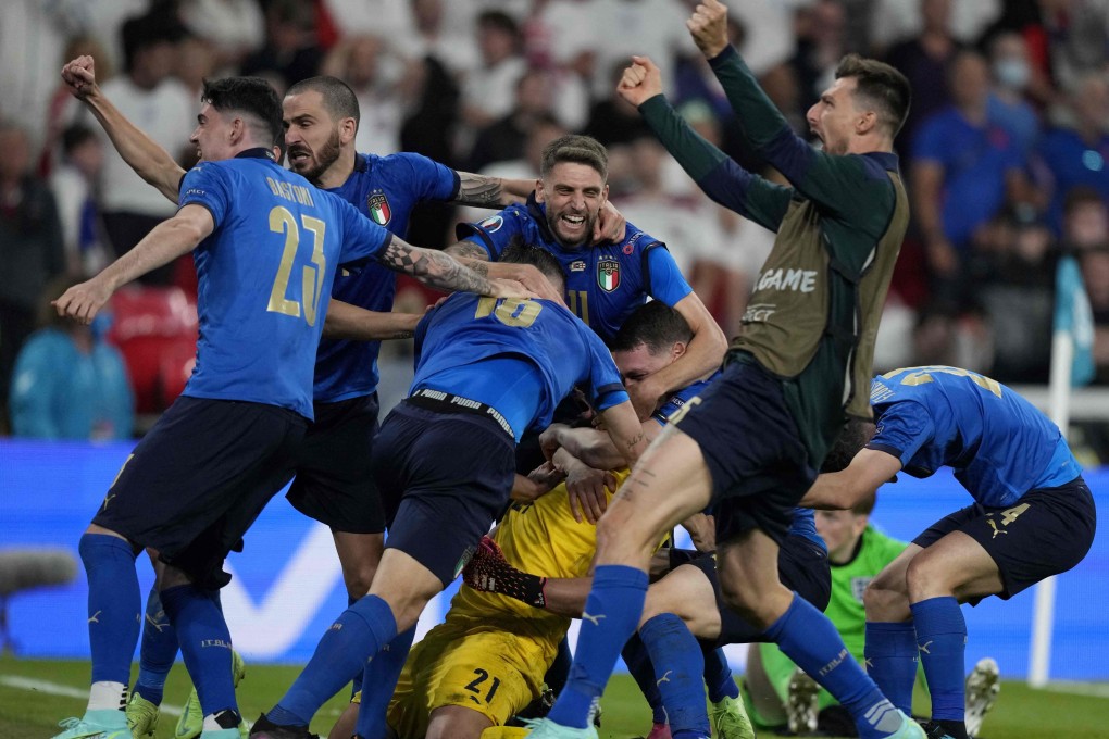 Italy players celebrate after winning the Uefa Euro 2020 final football match between Italy and England at Wembley Stadium in London on Sunday. Photo: AFP