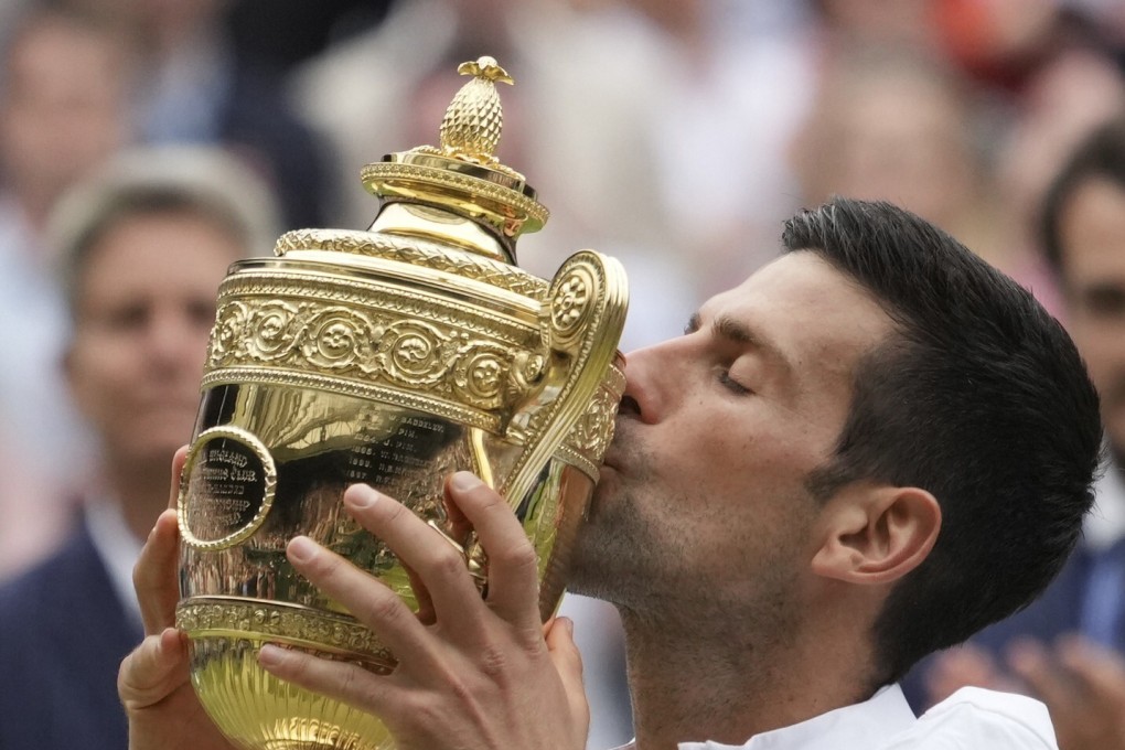 Serbia’s Novak Djokovic celebrates his victory over Italy’s Matteo Berrettini after the men’s singles final of the Wimbledon Tennis Championships in London on Sunday. Photo: AP