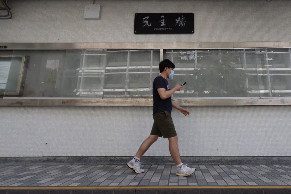 HKU has taken down all posters and banners displayed on its ‘democracy wall’ on campus. Photo: May Tse