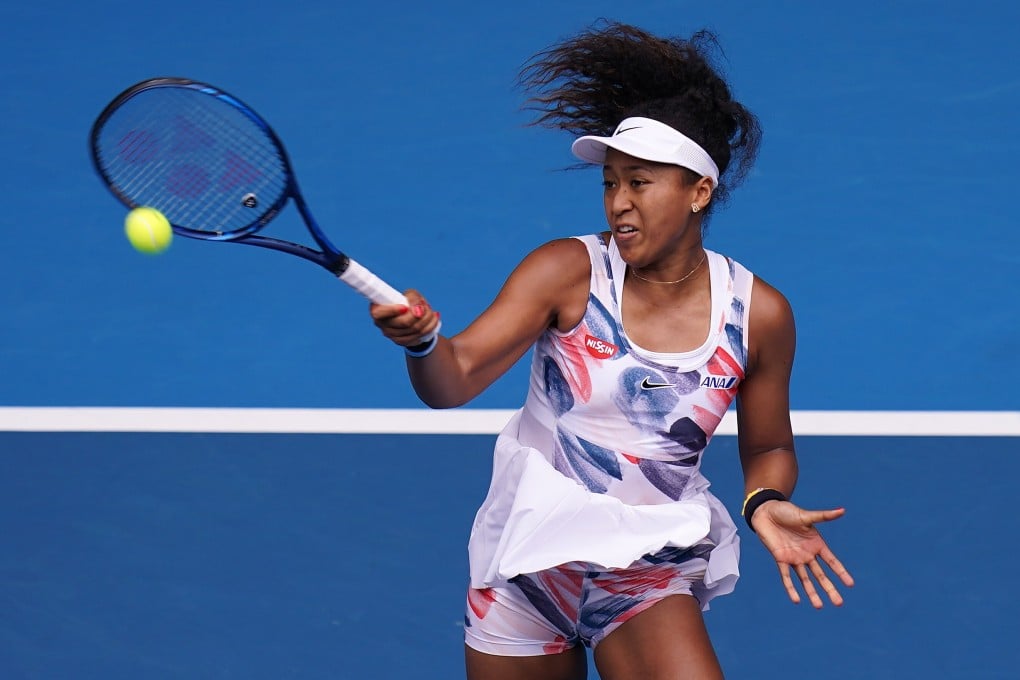 Naomi Osaka in action at the 2020 Australian Open. Her newly released Barbie wears the outfit. Photo: EPA