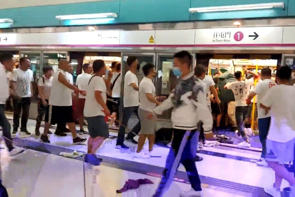 A mob of men in white T-shirts attacked protesters and passengers in Yuen Long MTR station. Photo: SCMP Pictures