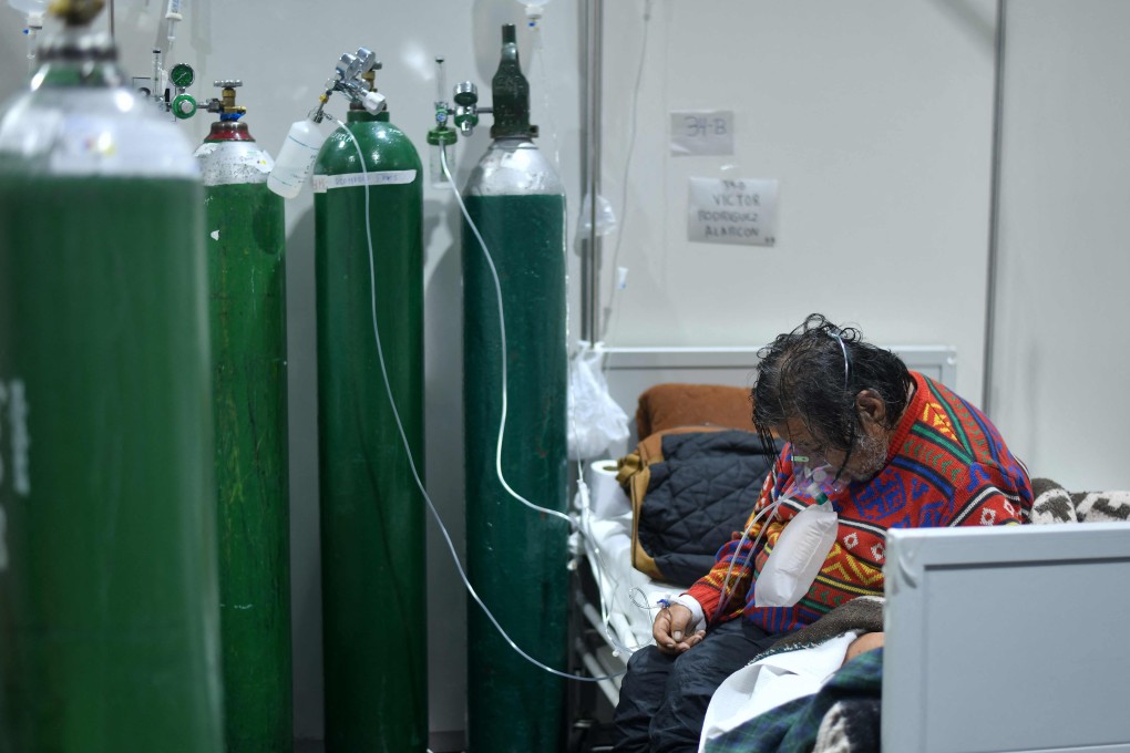 A Covid-19 patient receives oxygen in a hospital in Peru, where the Delta variant has led to a spike in cases. Photo: AFP