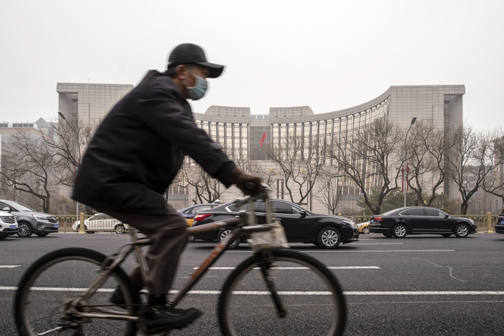 The People’s Bank of China (PBOC) said late on Friday it would trim the reserve requirement ratio by 0.5 percentage points for most banks, freeing up about 1 trillion yuan (US$154 billion) of long-term liquidity into the economy. Photo: Bloomberg