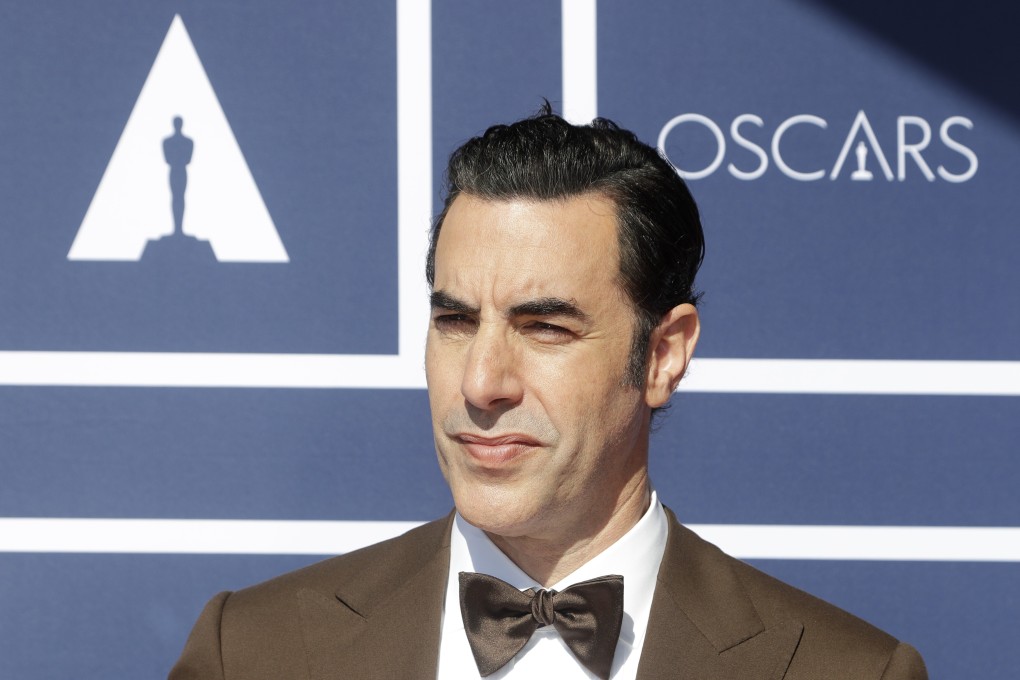 Sacha Baron Cohen has sued a Massachusetts cannabis dispensary over use of an image of his character Borat on a hoarding without his permission. Photo: AP